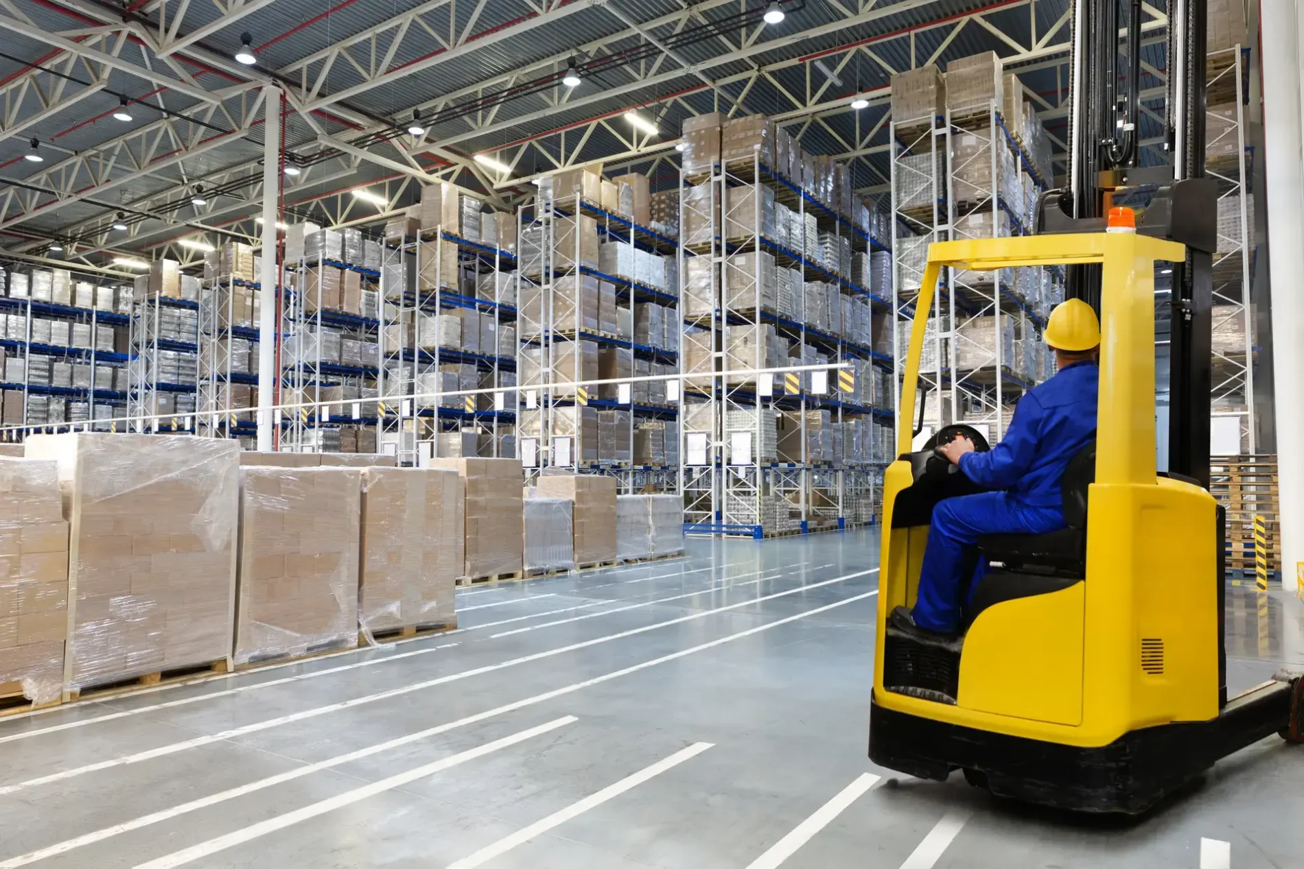 a forklift in a large warehouse